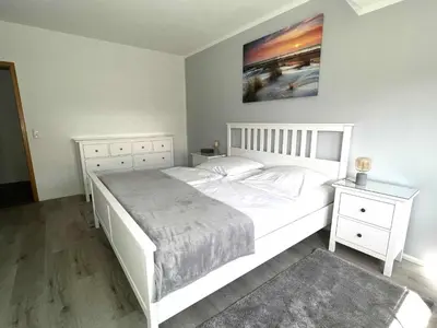 Ein Bett oder Betten in einem Zimmer der Unterkunft Appartementhaus Müller