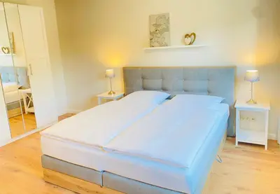 Ein Bett oder Betten in einem Zimmer der Unterkunft Ferienwohnung Smilla