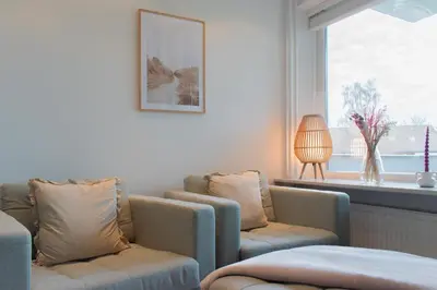 Ein Sitzbereich in der Unterkunft Ferienwohnung cozy - Scharbeutz