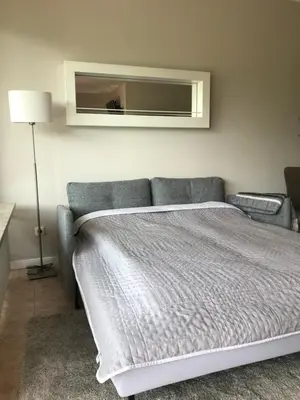Ein Bett oder Betten in einem Zimmer der Unterkunft Bellevue 16 KaMare - direkte Strandlage