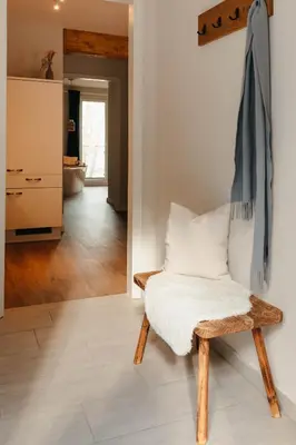 Ein Bett oder Betten in einem Zimmer der Unterkunft Tien Stuuv