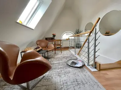 Ein Sitzbereich in der Unterkunft Modernes, familienfreundliches Apartment in Lübeck
