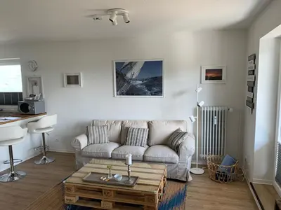 Ein Sitzbereich in der Unterkunft Apartment am See
