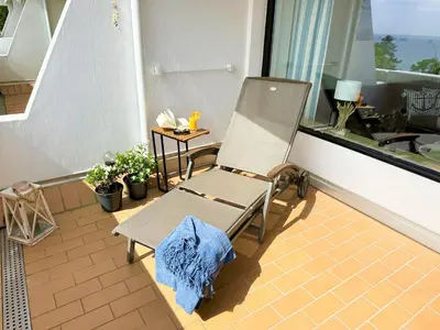 Ein Balkon oder eine Terrasse in der Unterkunft Ferienpark Sierksdorf App 193 - Strandlage Strandkorb