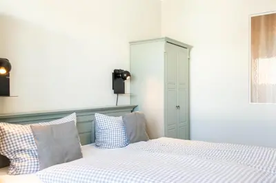 Ein Bett oder Betten in einem Zimmer der Unterkunft Ferienwohnung Beach 66 in Haffkrug