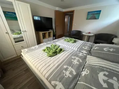 Ein Bett oder Betten in einem Zimmer der Unterkunft Ferienwohnung Liss