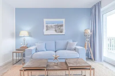 Ein Sitzbereich in der Unterkunft Ferienwohnung Haffdüün