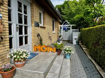 Ein Garten an der Unterkunft Haus Strandwinkel Ferienwohnung 