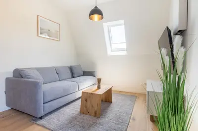 Ein Sitzbereich in der Unterkunft Villa Dornkamp 5