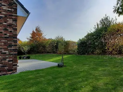 Ein Garten an der Unterkunft Schneckenhaus Ferienhaus