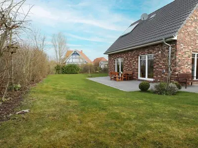 Ein Garten an der Unterkunft Schneckenhaus Ferienhaus