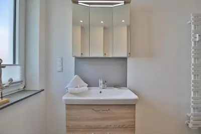 Ein Badezimmer in der Unterkunft Haus am Seehof 9 Ferienwohnung Ostseeliebe Nr 5